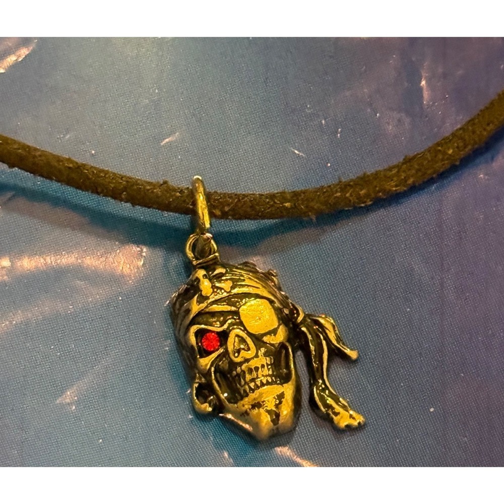 2026 Disney Parks Pirates Of The Caribbean Necklace Skull Crossbones Red Eye